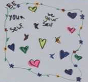 Quilt square with multicolor hearts that says "Be your self"