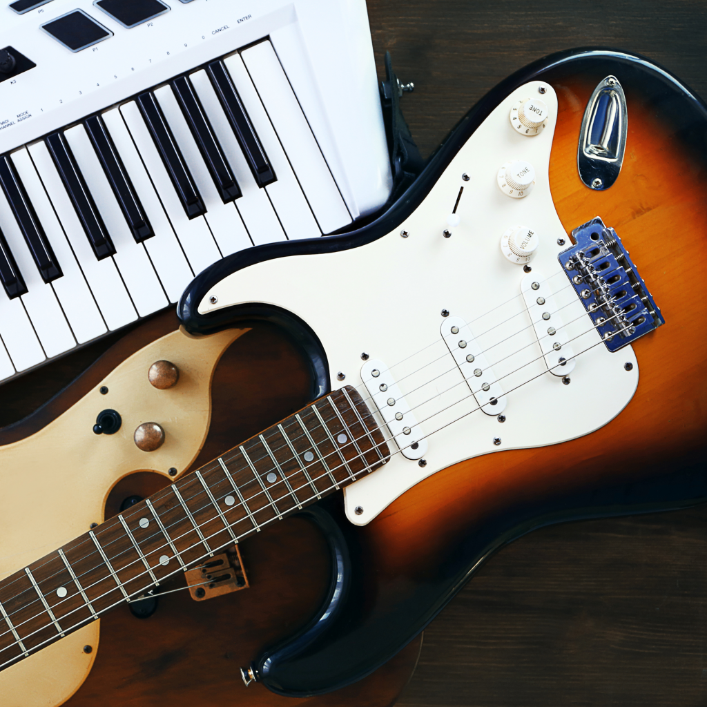 Musical instruments, including a guitar and keyboard
